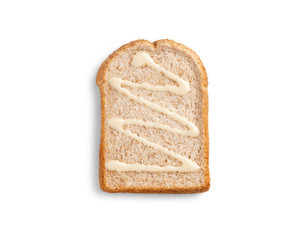 Wall Mural - slice whole grain bread with sweetened condensed milk on white background