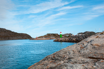 Two lighthouses on the rocks. For the safe passage of ships along the fairway .