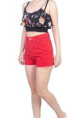 Wall Mural - girl in a crop top and red mini shorts with floral pattern isolated on white, body part, isolated on white