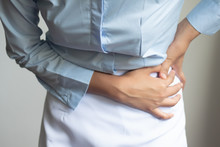 Injured Woman Suffering From Pelvis Pain Or Hip Joint Injury; Concept Of Pelvic Joint Pain, Hip Joint Dislocation, Rheumatoid Arthritis