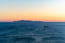 Sunset And Tranquil Aegean Sea In Greece