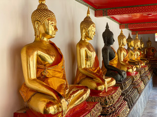 Buddha gold statues. Wat Pho, Bangkok, Thailand