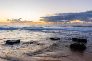 Rocky coastline in the morning at Turimetta Beach, Sydney, Australia.