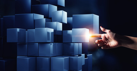 Poster - Hand holding glowing cubes. Innovation and creativity concept.