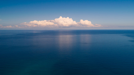 Poster - blue sea and clouds on sky