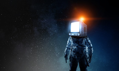 Wall Mural - astronaut with tv head in space. mixed media.