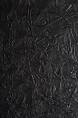 Canvas Print - black leather texture to background