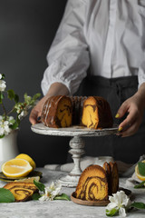 Wall Mural - Chocolate and pumpkin bundt cake and lemon zest