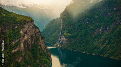 Fotomural Geiranger Fjord And Steep Cliffs In Norway.