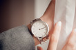 Beautiful silver watch on woman hand.