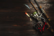 © Bohdan - Fishing tackle spinning fishing rod with lures spoon wobbler popper hooks on darken wooden background