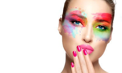 Wall Mural - Beautiful model girl with colorful make-up. Fashion makeup and cosmetics concept. Fine art beauty portrait