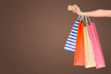 Poster - Close up woman hand with many shopping bags and credit card