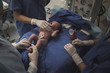 © Cavan Images - First moment of a newborn, labor in a hospital. After birth.