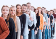© ASDF - group of diverse young people standing in line