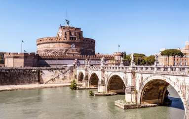 Wall Mural - Castel Sant’Angelo or Castle of Holy Angel, Rome, Italy. It is old landmark of city. View of famous Castel Sant`Angelo and medieval bridge