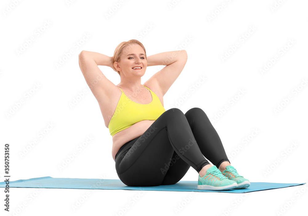 Woman with excess weight training on white background