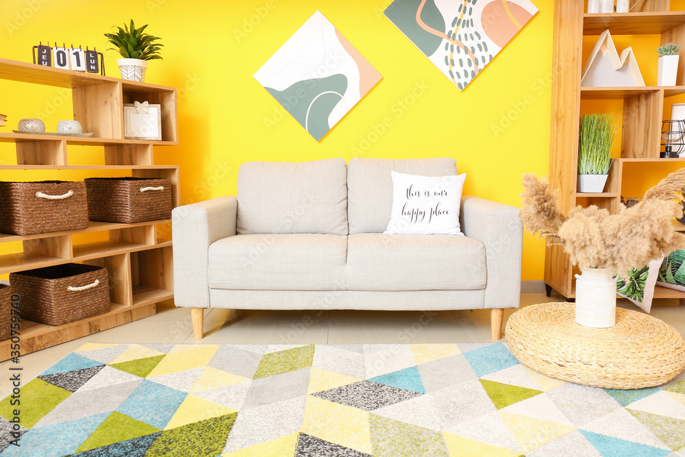 Interior of modern room with comfortable sofa