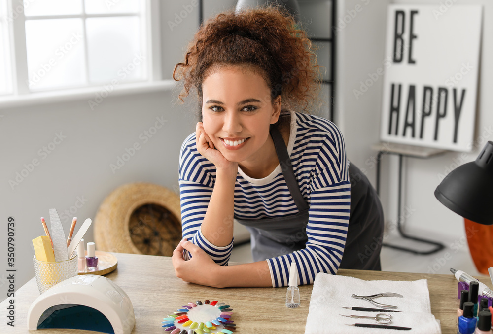 Portrait of manicure master in beauty salon