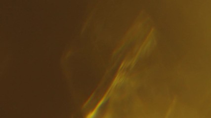 Wall Mural - gold intense organically captured light effect on black background. abstract light in motion for tra
