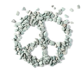 Wall Mural - Blue, cyan rocks, pebbles, stones pile arranged in hippie peace symbol isolated on white background, top view