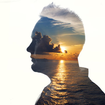Fototapete - Double exposure portrait of a man in contemplation at sunset time