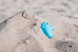 toy on the sand on the shore of Baltic Sea in Germany