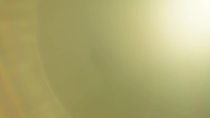 Wall Mural - warm lens flares in motion. beautiful gold light visual effects for transitions or overlays