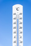 Fototapeta Mapy - thermometer and sky, heatwave in summer