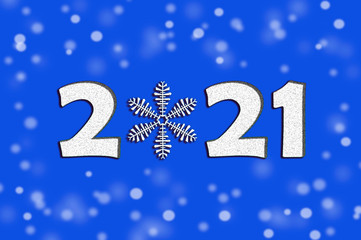 Banner with white numbers date 2021 and snowflake. Blue background. 