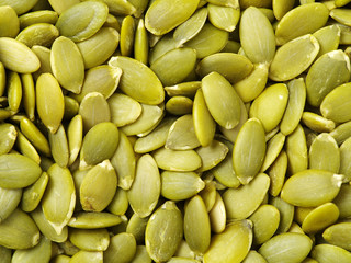 Poster - Macro background texture of green pumpkin seeds