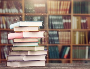 Canvas Print - The stack of study books in the library on the table.