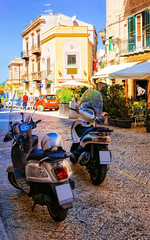 Poster - Scooter in the street of Monreale town Sicily reflex