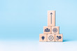 Business process management, Businessman plan a project with wooden cubes with icon business strategy on blue background. copy space