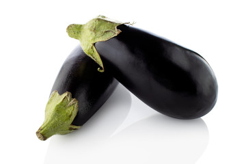 Eggplant. Two eggplant facing left on a white background. (Tr - patlican)
