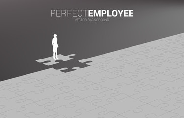 Poster - Silhouette of businessman standing on final jigsaw piece. Concept of perfect recruitment. Human Resource. put the right man on the right job.