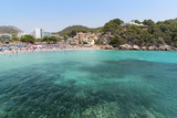 Fototapeta Kuchnia - Beach with people and sea landscape in Camp de Mar, Majorca