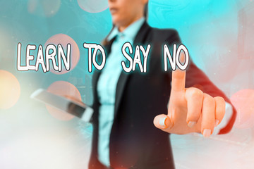 Writing note showing Learn To Say No. Business concept for decline or refuse few things before you destroy yourself