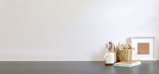 Workspace Mock up decorations and copy space on white table with white wall.