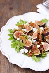 Sticker - fig salad, fried bacon, blackberry, feta cheese, pumpkin seeds, balsamic sauce