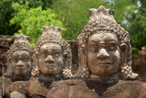 Close-up Of Statues In Row Outdoors