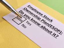 A Person Is Answering Question About Employee Stock Ownership Plan (ESOP).