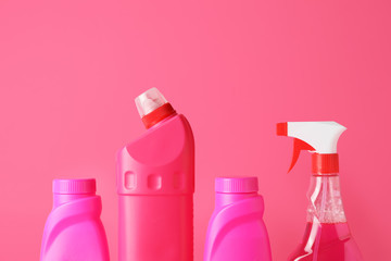 Set of cleaning supplies on color background