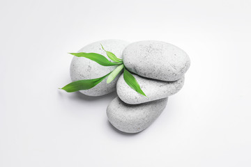 Spa stones on white background