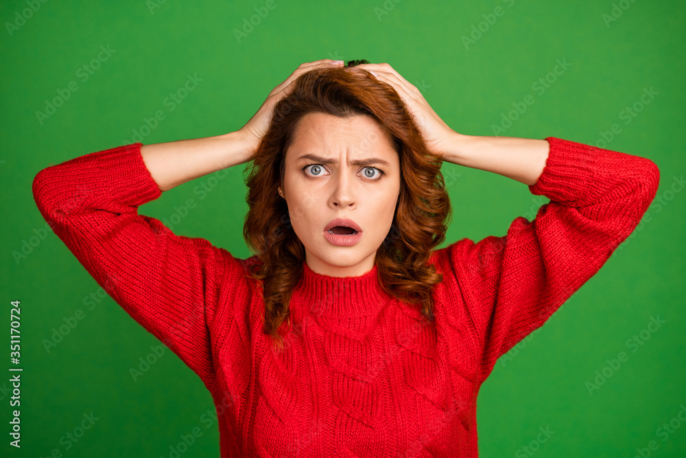 Portrait of astonished frustrated woman hear horrible work mistake novelty impressed scream omg touch hands redhead wear knitted pullover isolated over vivid color background - obrazy, fototapety, plakaty 