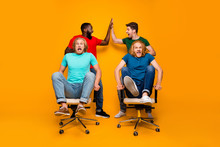Full Size Photo Two Men Afro American Meeting Hold Hands High Five Gesture Persuade Blonde Hair Pals Office Chair Ride Race Scared Fast Speed Isolated Yellow Color Background
