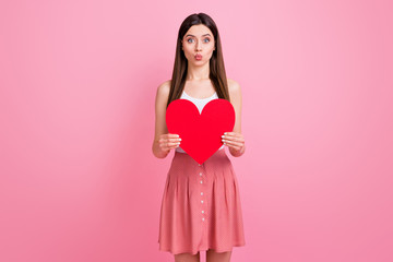 Sticker - Portrait of her she nice-looking attractive lovely lovable cheerful dreamy funny shy straight-haired girl holding in hand paper card sending air kiss isolated over pink pastel color background