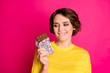 Portrait of positive dreamy girl hold chocolate milky bar look want eat snack bite lips wear style stylish trendy jumper isolated over shine color background