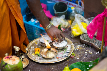 Wall Mural - hands monk who  makes the sacred rite of the Indian festival