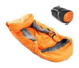 Orange sleeping bags on white background. Camping equipment